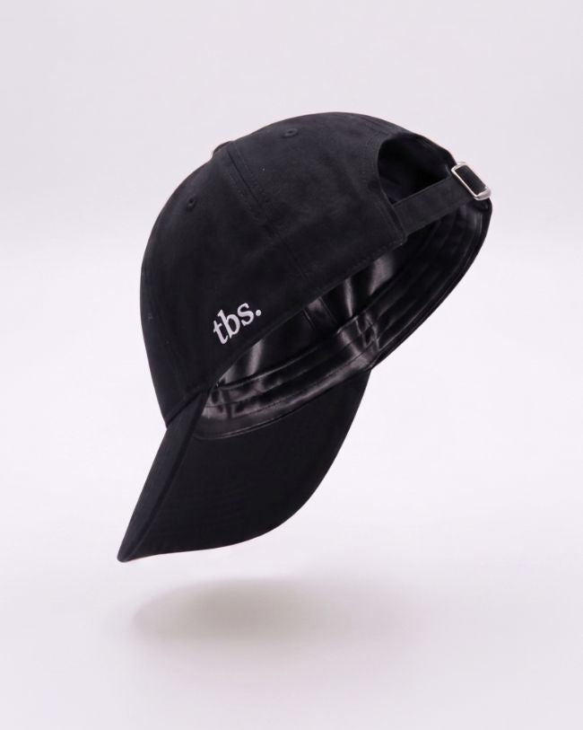 Black coloured silk-lined cap from The Big Silk. 
