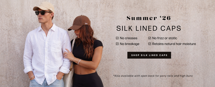 Two people wearing silk lined caps with promotional text on a beige background